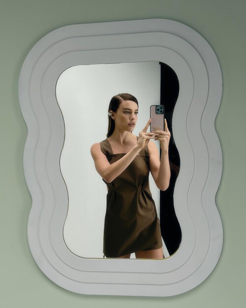 Photo by Alice Wegmann on April 18, 2023. May be an image of 1 person, slip and mirror.