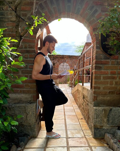 Photo-shared-by-Klebber-Toledo-on-March-31-2023-tagging-stalkeroficial-and-13thprod.-May-be-an-image-of-1-person-practicing-yoga-standing-and-brick-wall..jpg