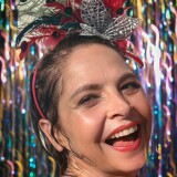 Photo-by-Drica-Moraes-on-February-20-2023.-May-be-an-image-of-1-person-headdress-and-tinsel.