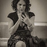 Photo-by-Drica-Moraes-on-March-16-2023.-May-be-a-black-and-white-image-of-1-person-phone-miniskirt-and-mirror.