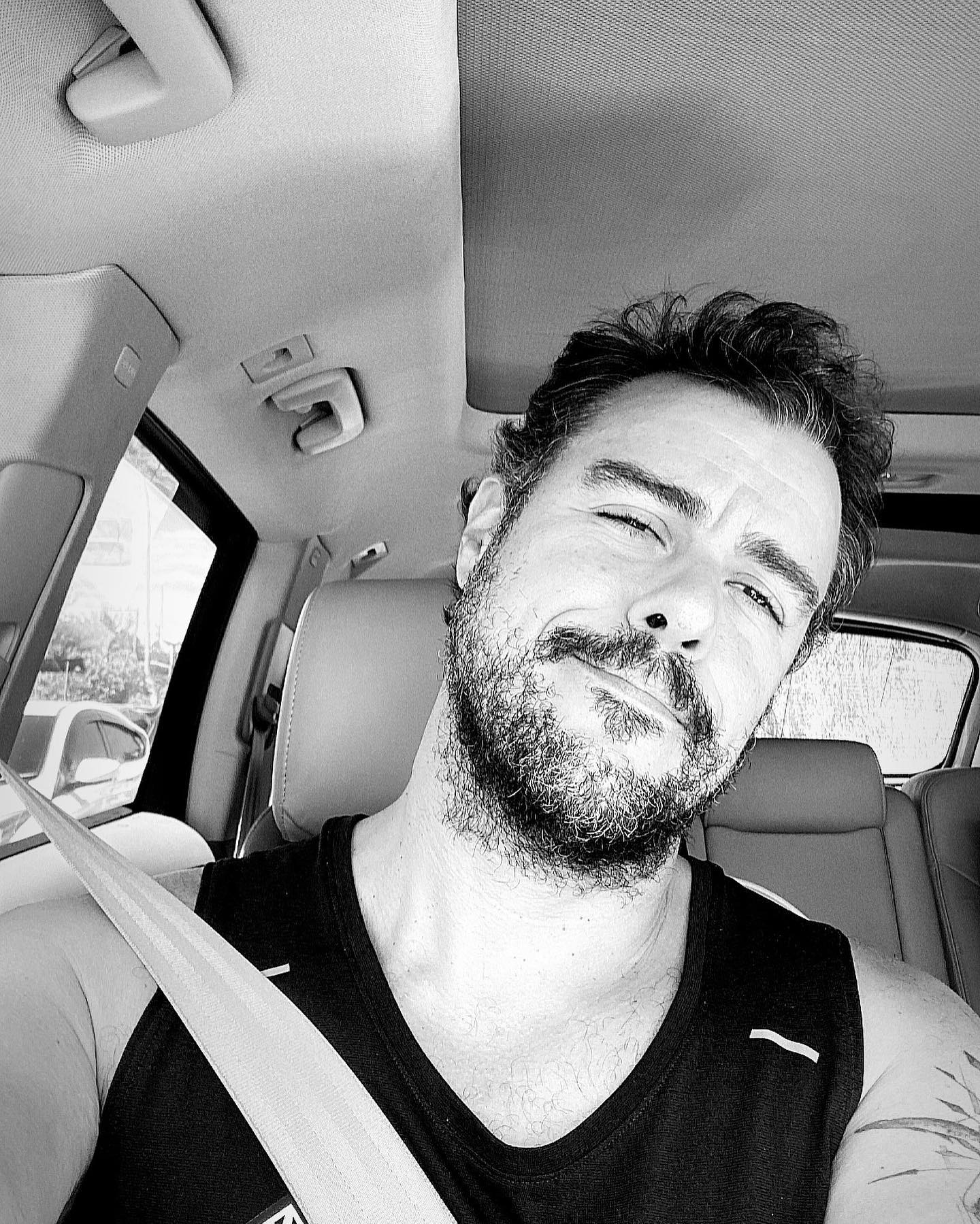 https://e.radikal.host/2023/04/22/Photo-by-Joaquim-Lopes-on-February-19-2023.-May-be-a-black-and-white-image-of-1-person-beard-tanktop-and-seatbelt..jpg