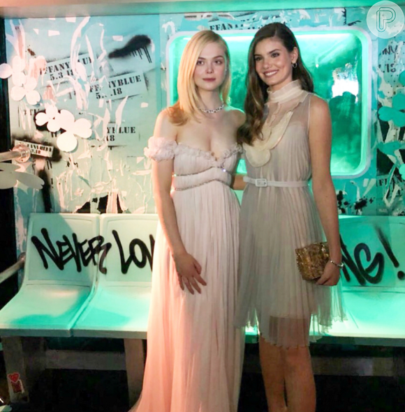 https://e.radikal.host/2024/12/03/2597509-camila-queiroz-encontrou-elle-fanning-la-580x0-3.png