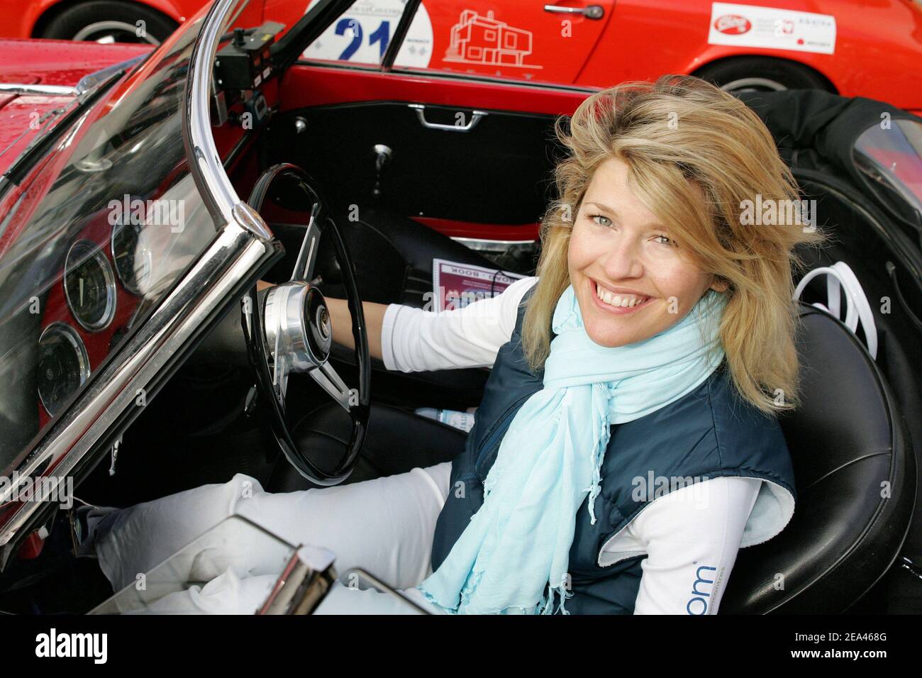 https://e.radikal.host/2025/02/14/australian-born-tv-presenter-lynda-lacoste-on-her-alfa-romeo-guila-on-the-departure-of-the-6th-edition-of-rallye-des-princesses-starting-from-place-vendome-in-paris-on-may-23-2005-towa089f05bec9e3c355.jpg